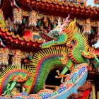 Image of a Chinese Dragon themed celebration float. 