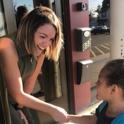 Principal practice: Joelle Formato (EdM ’15) greets students each morning as they arrive at Buffalo’s Persistence Preparatory Academy Charter School, which she founded in 2018. Formato believes a personal welcome helps young scholars know they are cared for and respected. 