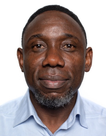 Headshot of Rexwhite T. Enakrire. 