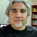Headshot of Ali Fauzi. 