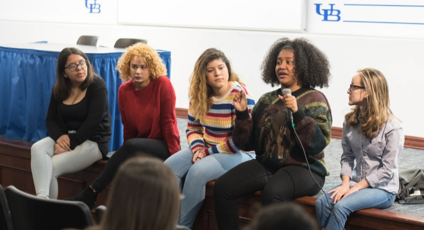 Latina students address room regarding college access. 