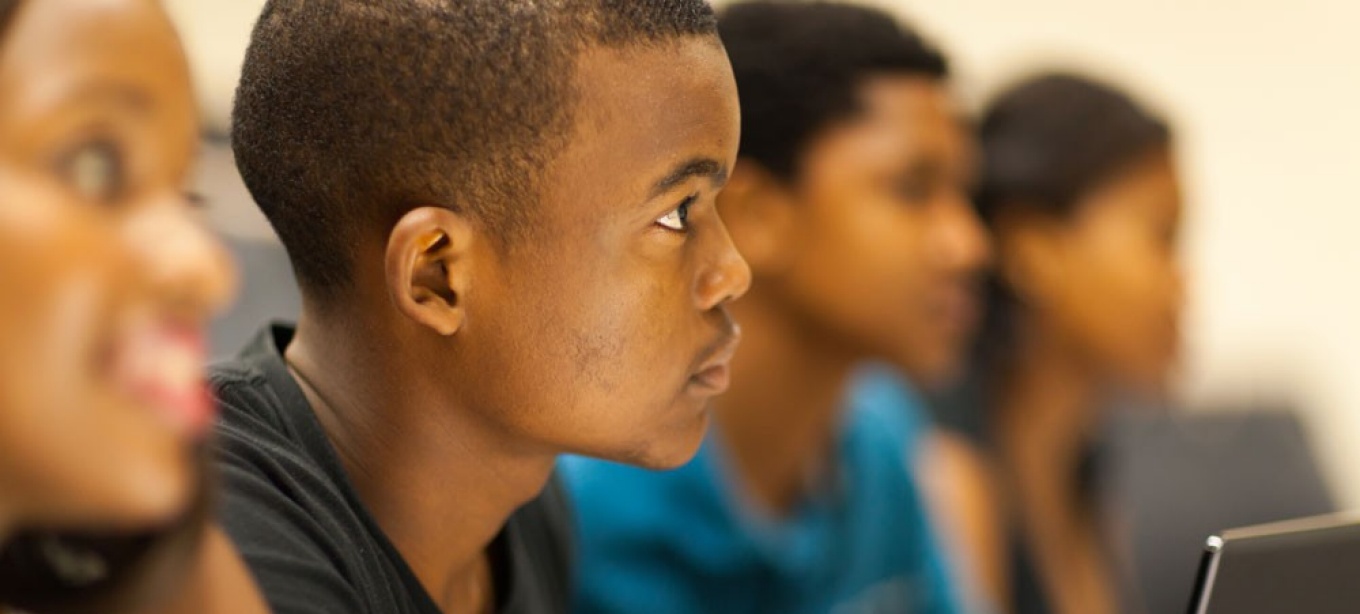 African American students working in a classroom. 