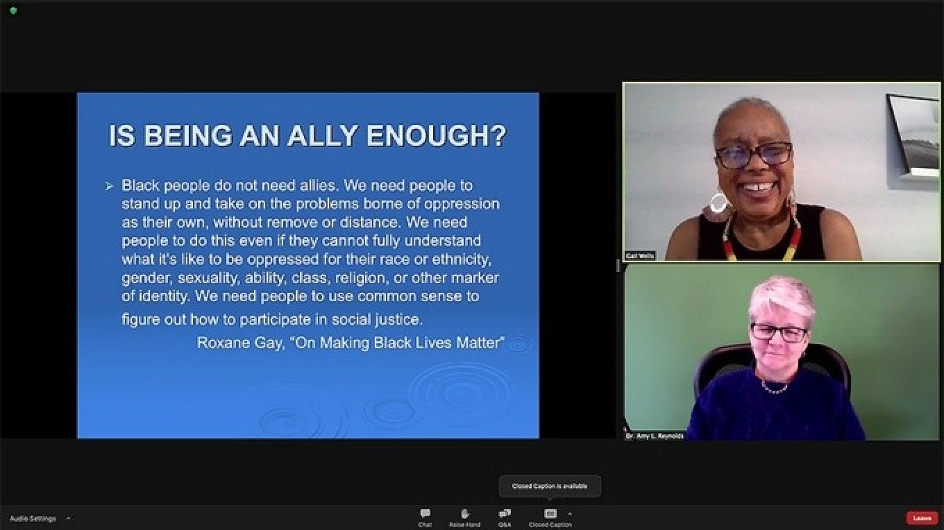 Video conference screen featuring presentation by Amy Reynolds. 
