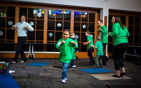 Zoom image: Children having fun in a yoga class. 