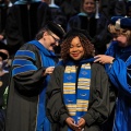Doctoral candidate being hooded at the UB GSE 2022 commencement ceremony. 