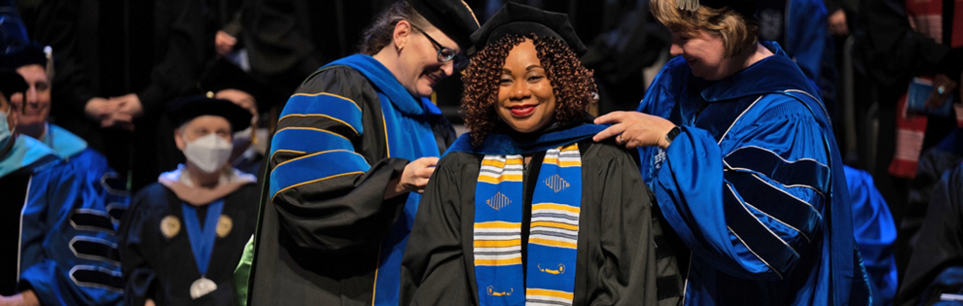 Doctoral candidate being hooded at the UB GSE 2022 commencement ceremony. 