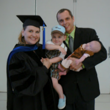 Zoom image: Pauline at May 2008 Commencement Ceremony with her family. 