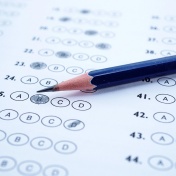 Standardized test bubbles with a pencil. 