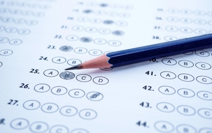 Standardized test bubbles with a pencil. 