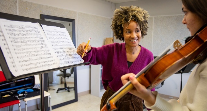 Melissa White leads a chamber music session with a student.