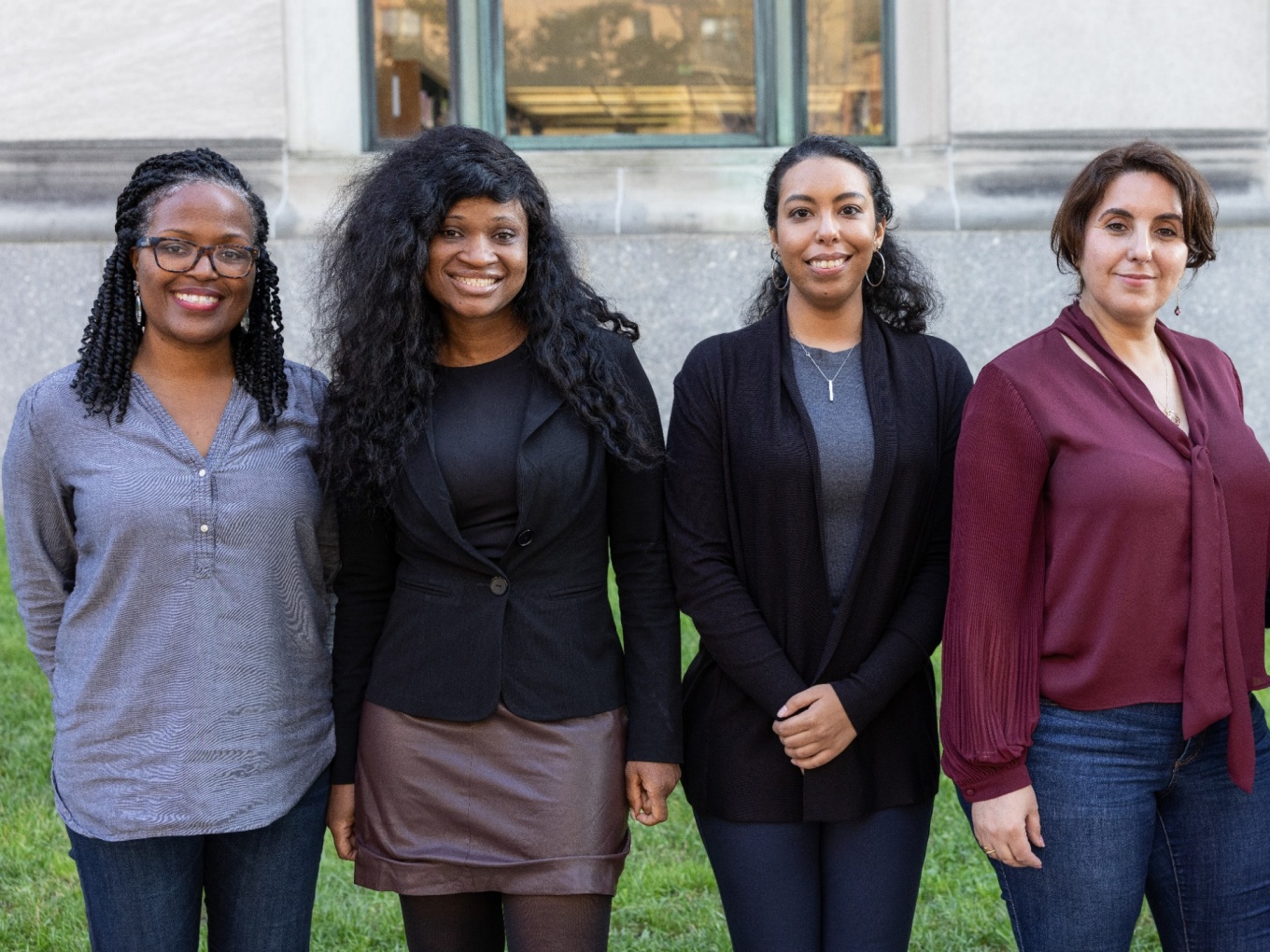 Information science students pose for a photo. 