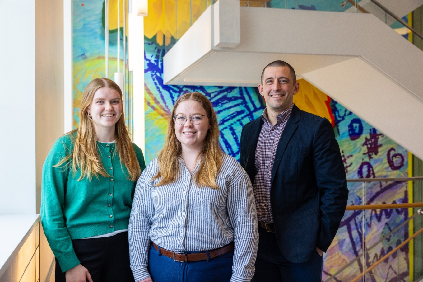 Graduate students Lauren Reinhart and Melissa Safford with Ryan Creps. 