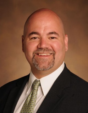 headshot of Mark Hicar. 