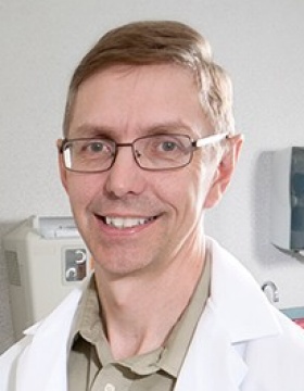 Portrait of UB researcher David Holmes. 