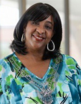 Portrait of UB social work professor Kelly Patterson. 