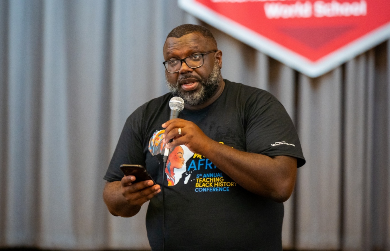 UB Graduate School of Education professor LaGarrett King speaking at an event. 