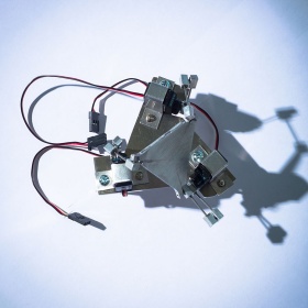 The "CanJam" manipulator allows a user to steer satellites using a wheel with three degrees of freedom &mdash; tilting forward and backward, swiveling left and right, and pivoting side to side. 