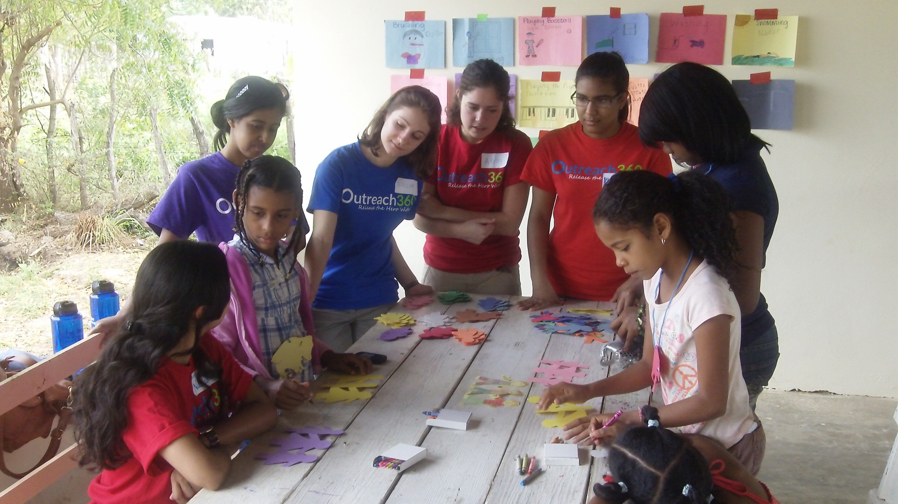 UB students working with Dominican students. 