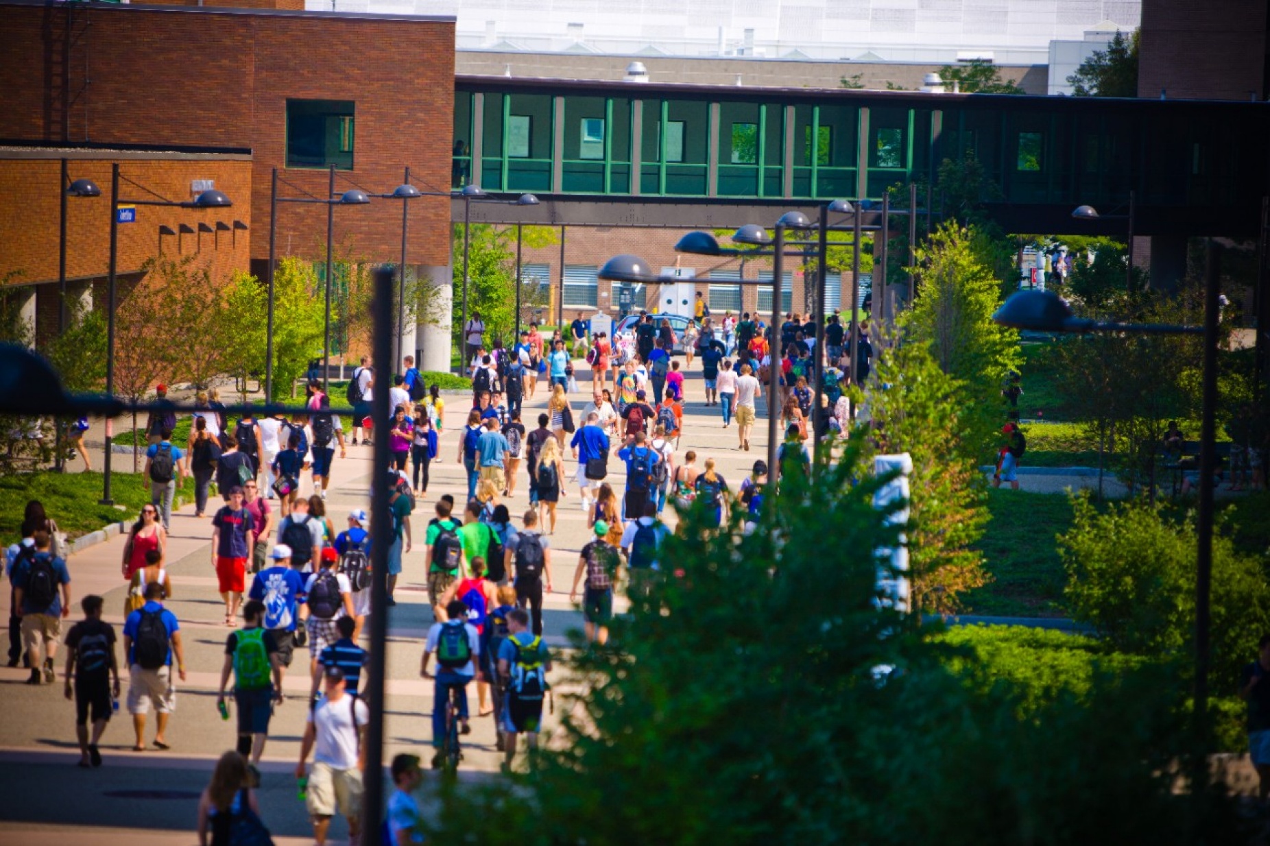 Students walk along Founders Plaza on the UB North Campus. 