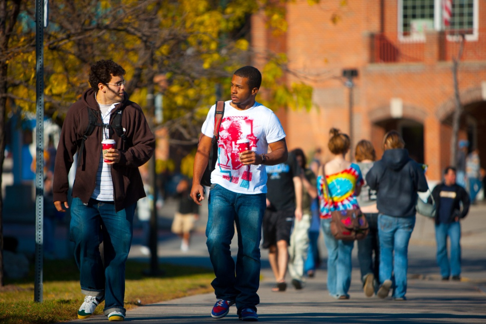 Students walk across Founders Plaza on the UB North Campus.
