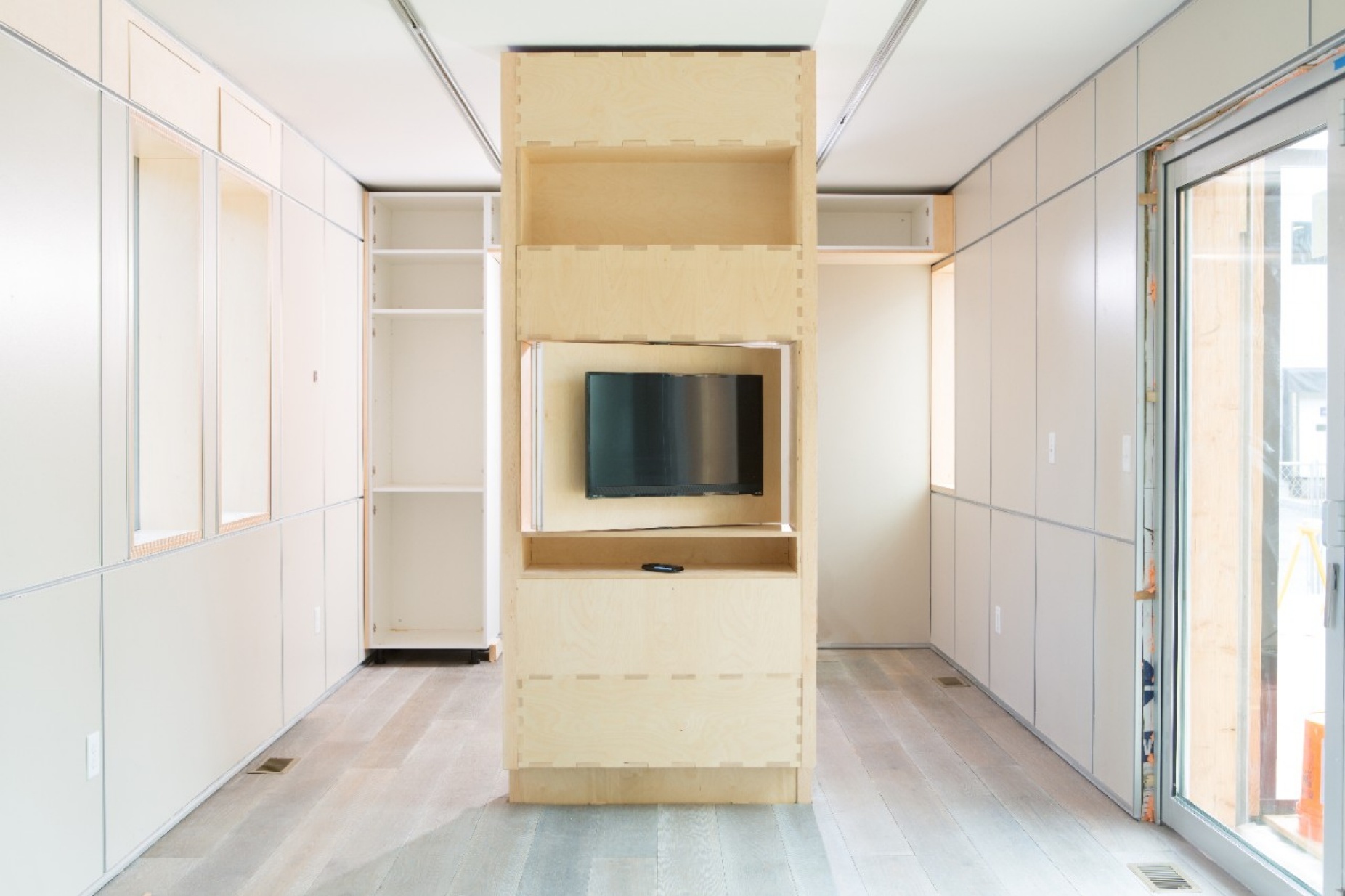 A wooden stand with shelving. 