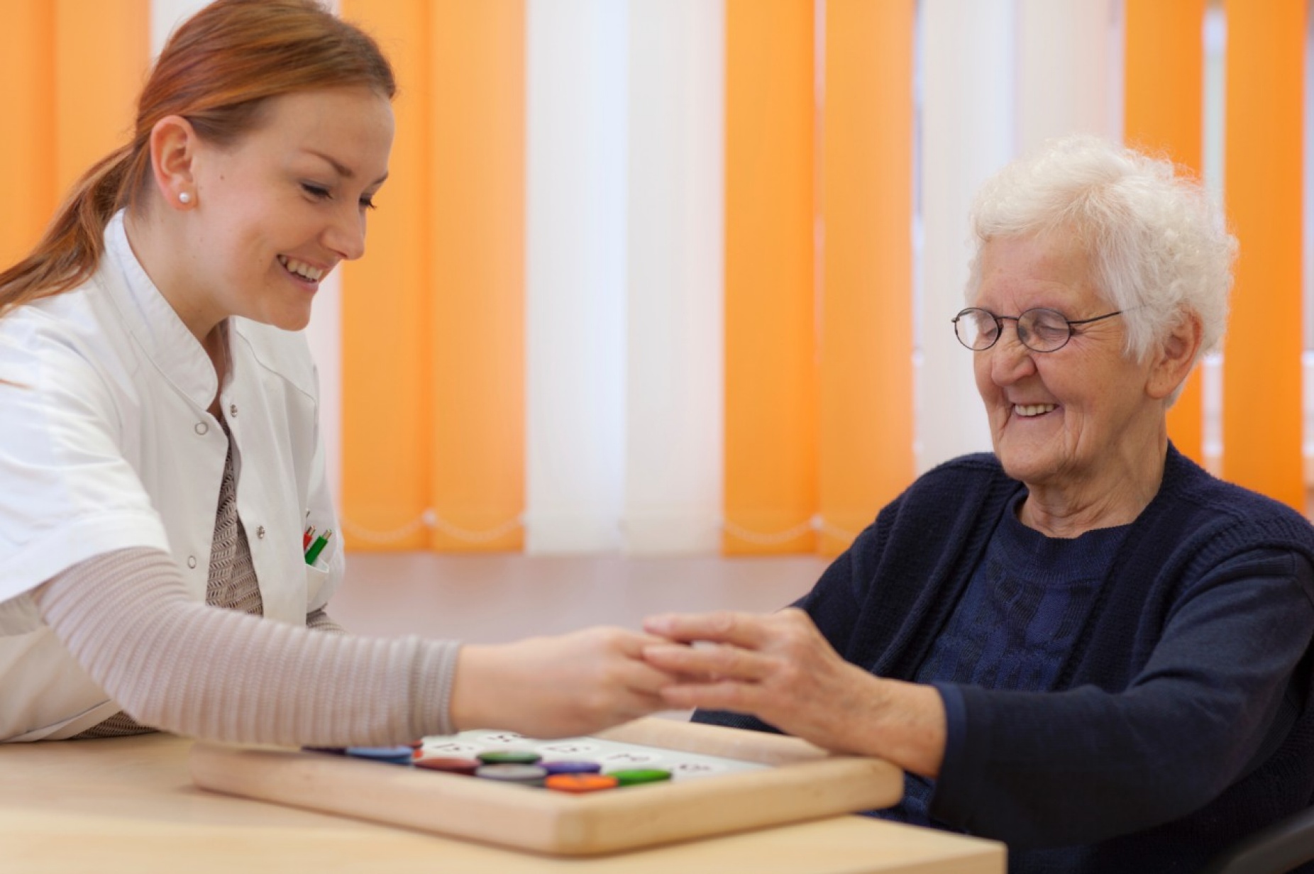 Woman helping senior. 