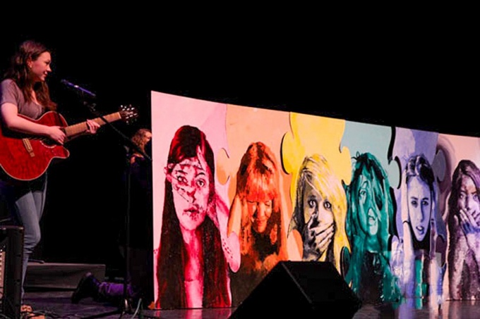 A student performs as part of the BAND Against Bullying competition.