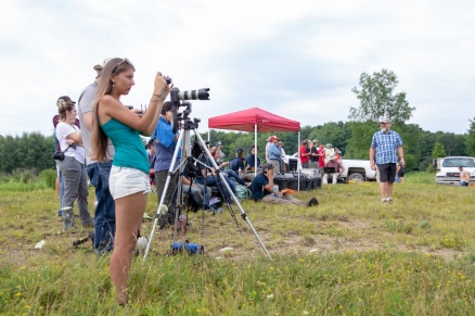 Zoom image: Volcanologist Arianna Soldati watches one of four blast tests that took place. Prior to the explosion — Soldati, a postdoctoral researcher at Ludwig Maximilian University — set up a 3-D, 360-degree camera to collect data closer to the blast site. Credit: Meredith Forrest Kulwicki 