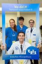 Group B team members Justin Roulley (seated), Megan Risio (left), Ia-Je Tsai (middle) and Richard Rovelli (right) also saved their patient. 