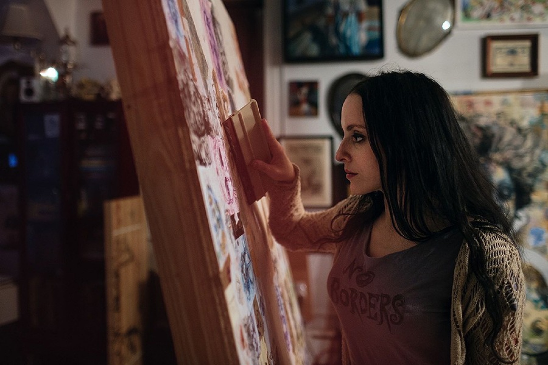 Artist Molly Crabapple working on an art project. 