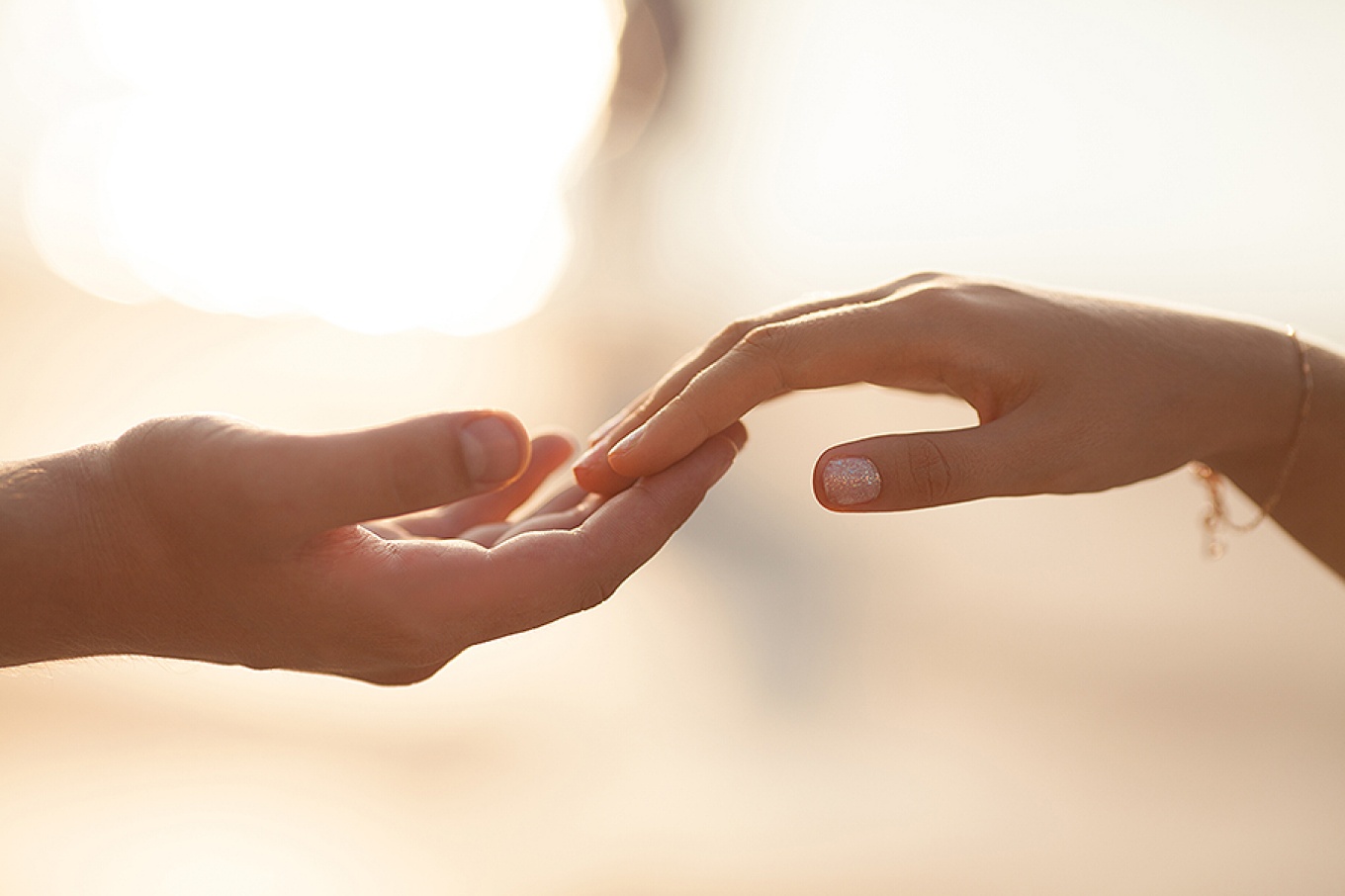 Couple holding hands.