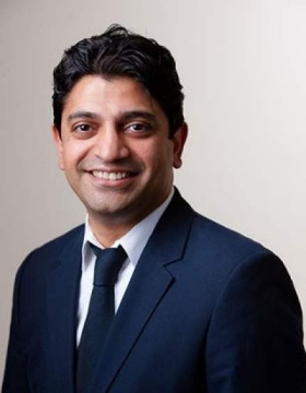 Portrait of UB architecture professor Omar Khan. 