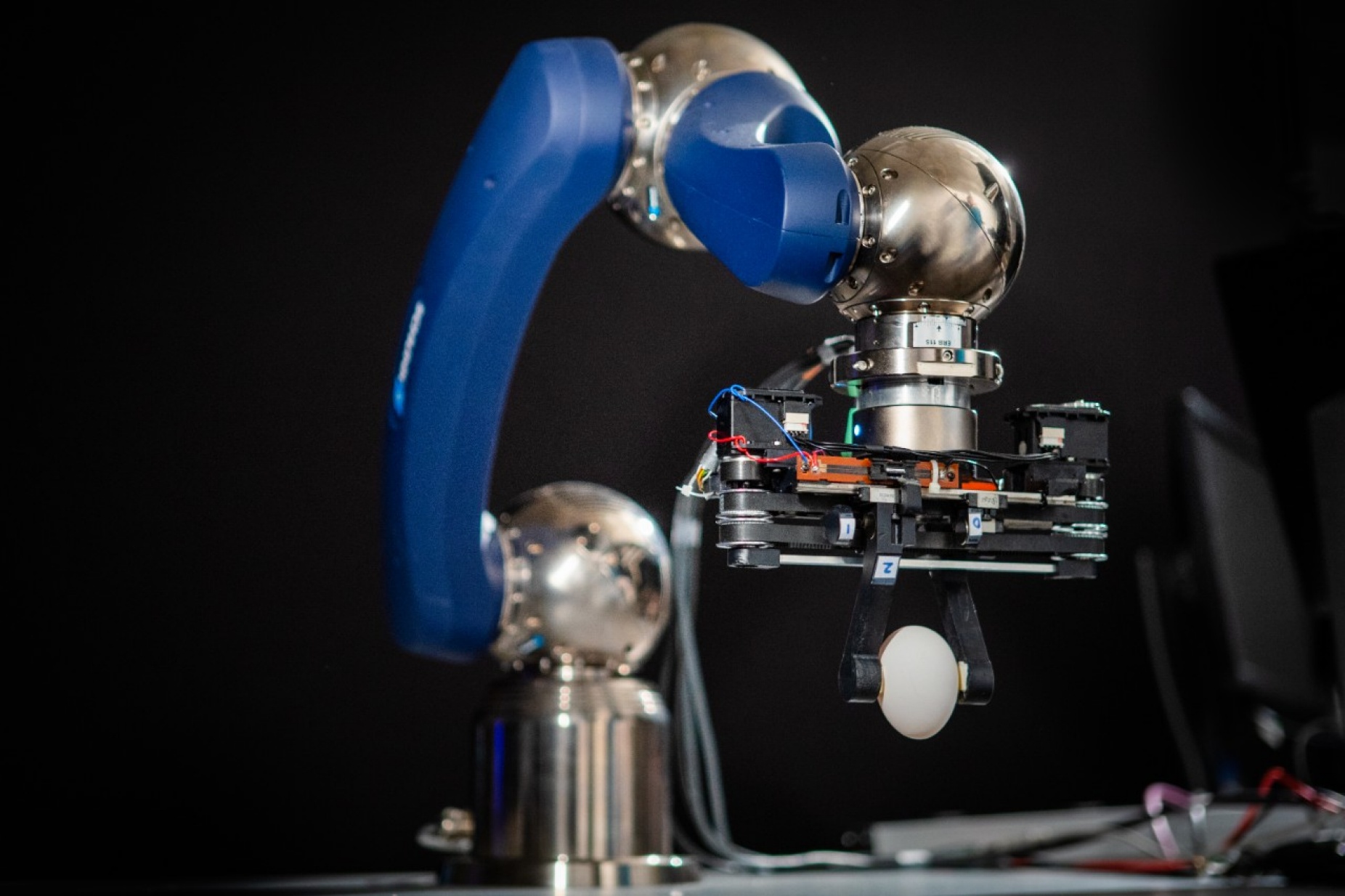 Zoom image: A robotic gripper developed in the lab of University at Buffalo engineer Ehsan Esfahani. The gripper is attached to a commercially available robot arm. Credit: Douglas Levere / University at Buffalo 