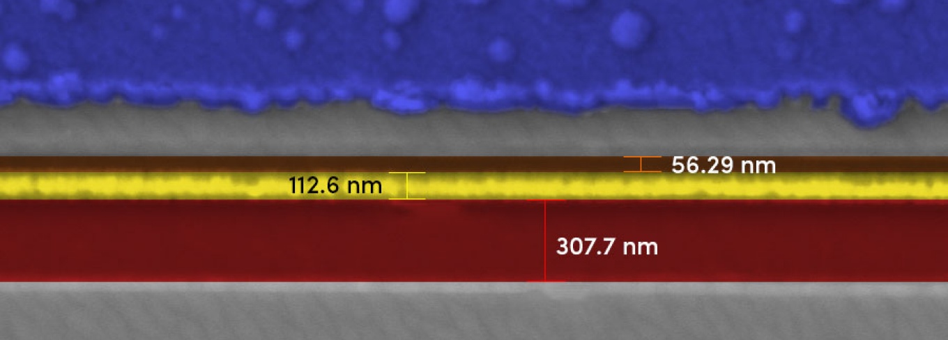 This image shows a close-up view of a gallium oxide transistor created with an electron beam lithography (EBL) system. The gate (the yellow line) is about 100 nanometers wide — a typical sheet of paper is 100,000 nanometers thick. This is an example of the extremely tiny structures that can be fabricated with EBL systems.