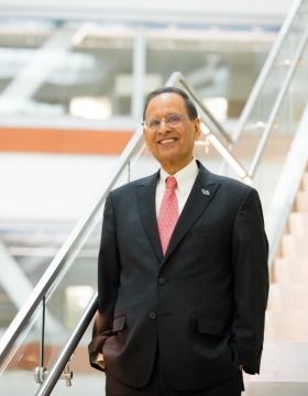Photo of UB President Satish K. Tripathi in the Jacobs School of Medicine and Biomedical Sciences building. 