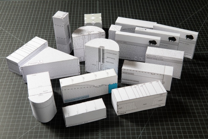 Zoom image: University at Buffalo hydrology researcher Chris Lowry has created numerous foldable aquifers to help students visualize how water is stored underground. Credit: Douglas Levere / University at Buffalo 