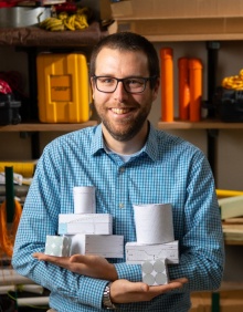 Zoom image: Chris Lowry, a University at Buffalo hydrology researcher, is creator of the Foldable Aquifer Project. Credit: Douglas Levere / University at Buffalo 