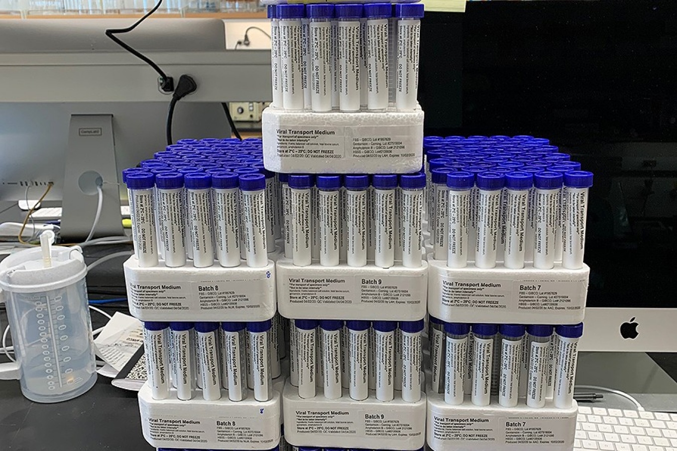 Batches of viral transport medium for COVID-19 testing.