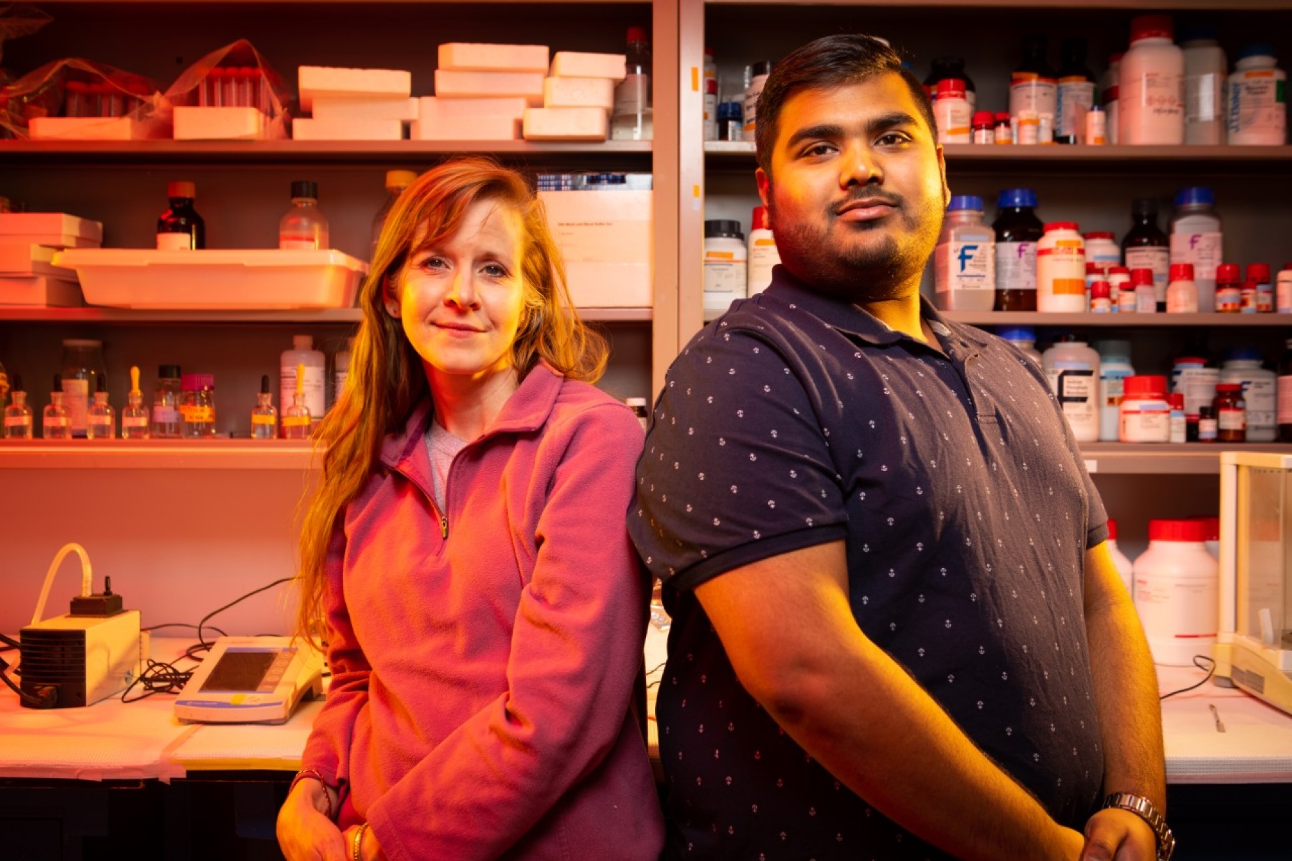 Zoom image: Researchers Kathryn Medler (left), University at Buffalo associate professor of biological sciences, and Debarghya Dutta Banik, a UB PhD graduate who is now a postdoctoral fellow at the Indiana University School of Medicine, pictured in 2019 at UB. Credit: Douglas Levere / University at Buffalo 