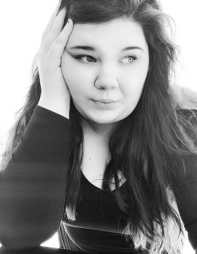 Black and white photo of Amanda Hart. 
