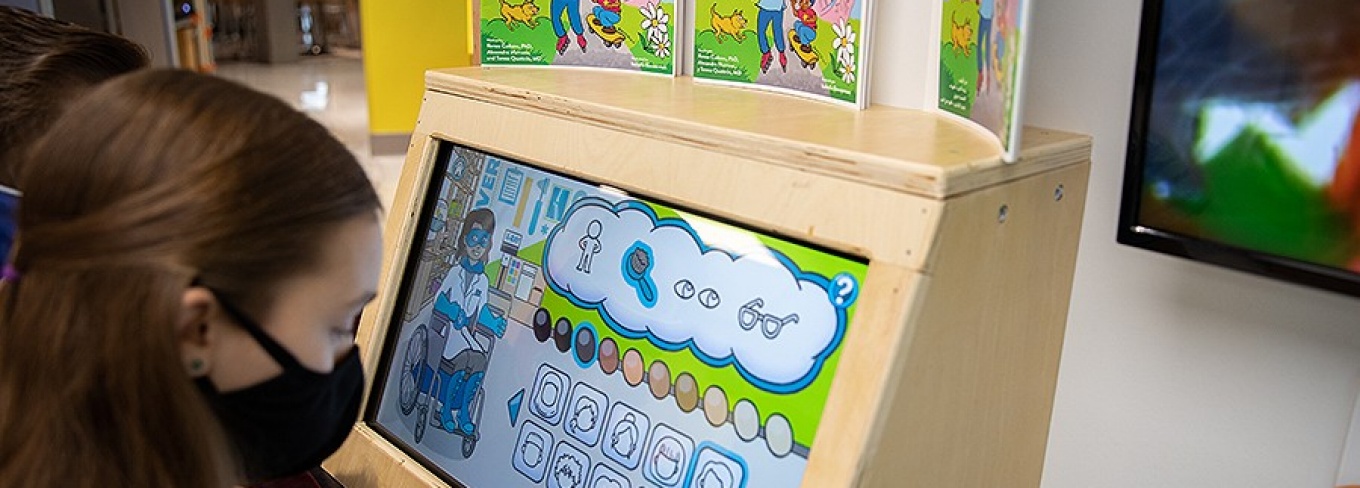 Rachel Drapeau plays the Sofia video game. 