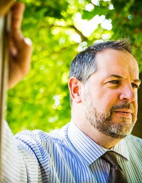 Environmental head shot of Robert Wahler, Jr. outside. 