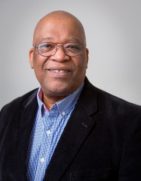 Portrait of UB transnational studies professor Cecil Foster. 