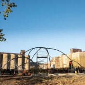 Zoom image: University at Buffalo architecture students designed and built a steel structure at Silo City in Buffalo that will train the branches of willow trees to form a canopied gathering space. Photo: Meredith Forrest Kulwicki 