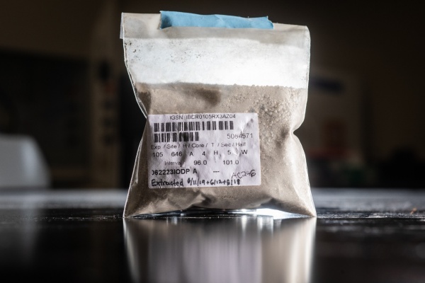 Zoom image: A bag containing ocean-bottom sediments after materials such as leaf wax chemicals have been extracted. Credit: Douglas Levere / University at Buffalo. Download additional photos. 