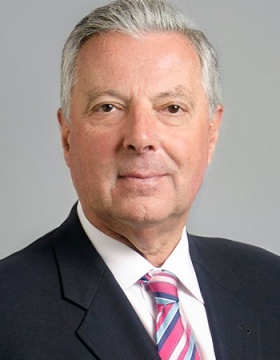 Portrait of Michael E. Cain, MD, UB's vice president for health sciences. 