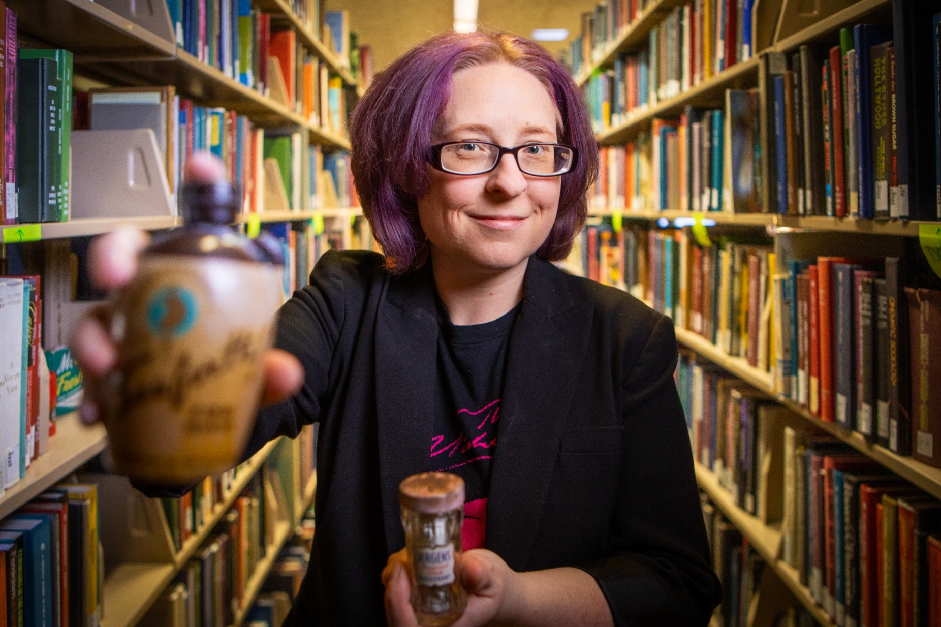 Zoom image: Cari Casteel, University at Buffalo clinical assistant professor of history, studies the history of deodorant. Credit: Douglas Levere / University at Buffalo 