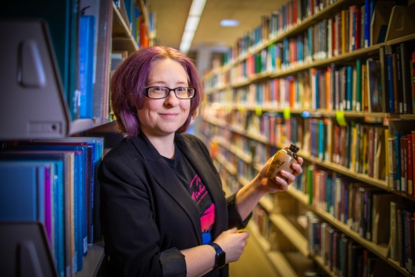 Zoom image: Cari Casteel, University at Buffalo clinical assistant professor of history, studies the history of deodorant. Credit: Douglas Levere / University at Buffalo 