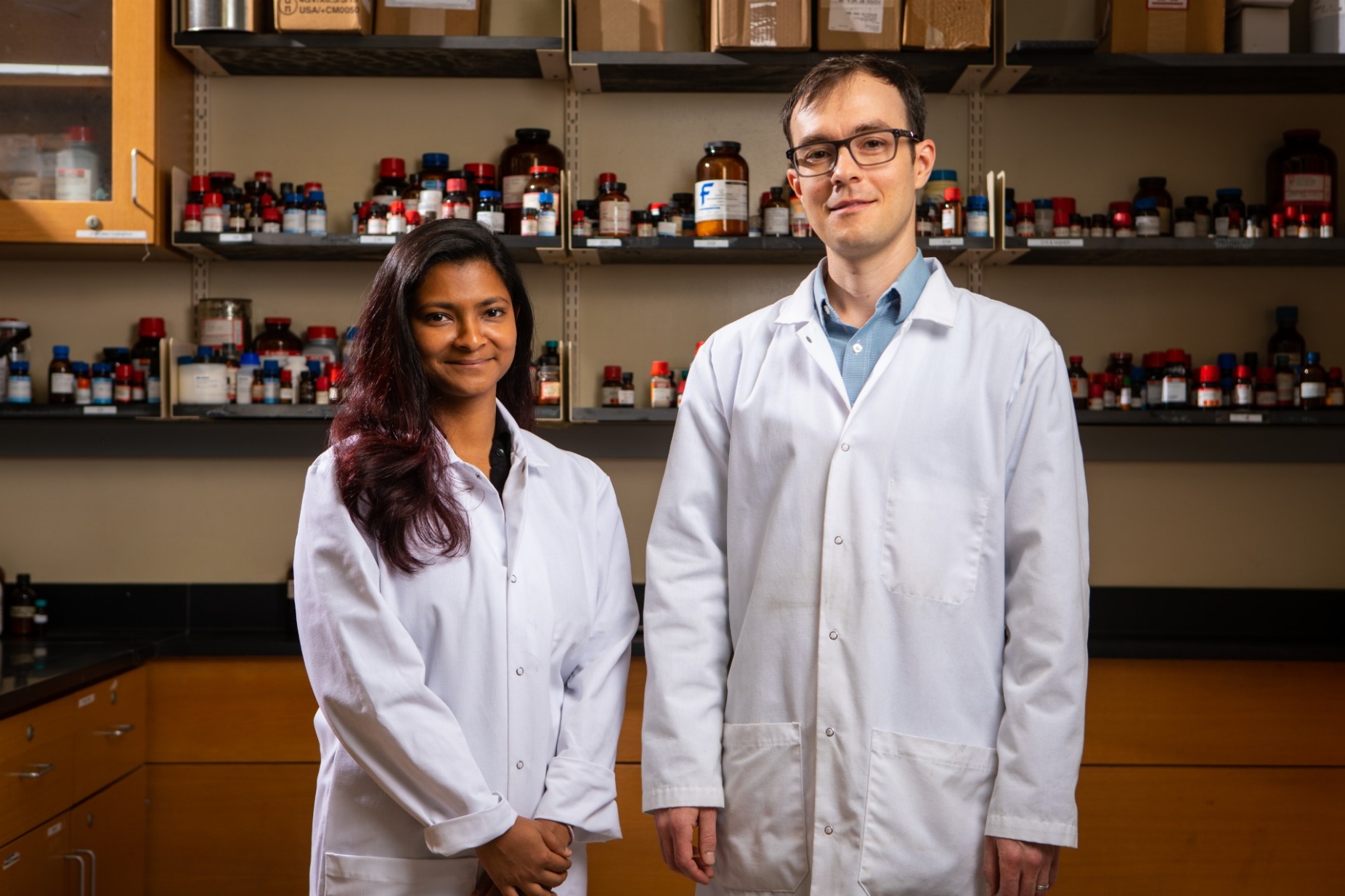 Zoom image: From left: Ananya Saju, the first author of the new study and a UB PhD student in chemistry, with David Lacy, senior author and UB associate professor of chemistry. Credit: Douglas Levere / University at Buffalo 