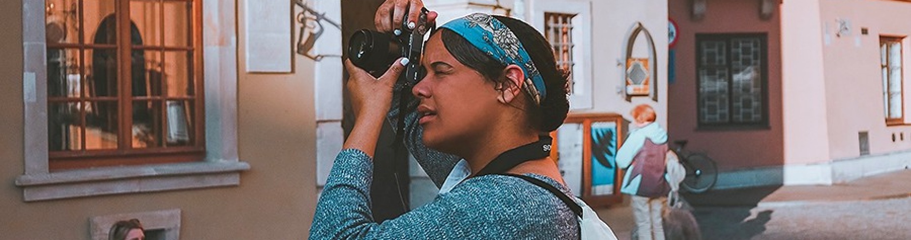 Alexis Harrell takes photos in Old Town Warsaw during her Humanity in Action fellowship trip to Poland last summer. 